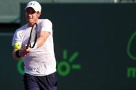 Apr 1, 2015; Key Biscayne, FL, USA; Andy Murray hits a backhand against Dominic Thiem (not pictured) on day ten of the Miami Open at Crandon Park Tennis Center. Murray won 3-6, 6-4, 6-1. Mandatory Credit: Geoff Burke-USA TODAY