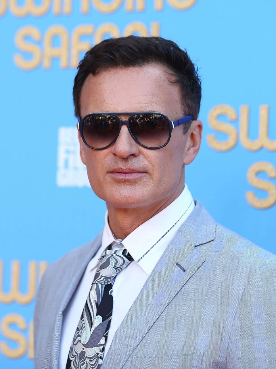 Julian McMahon (here looking suave at the Swinging Safari premiere) was totally down to share his thoughts on swinging. Source: Getty