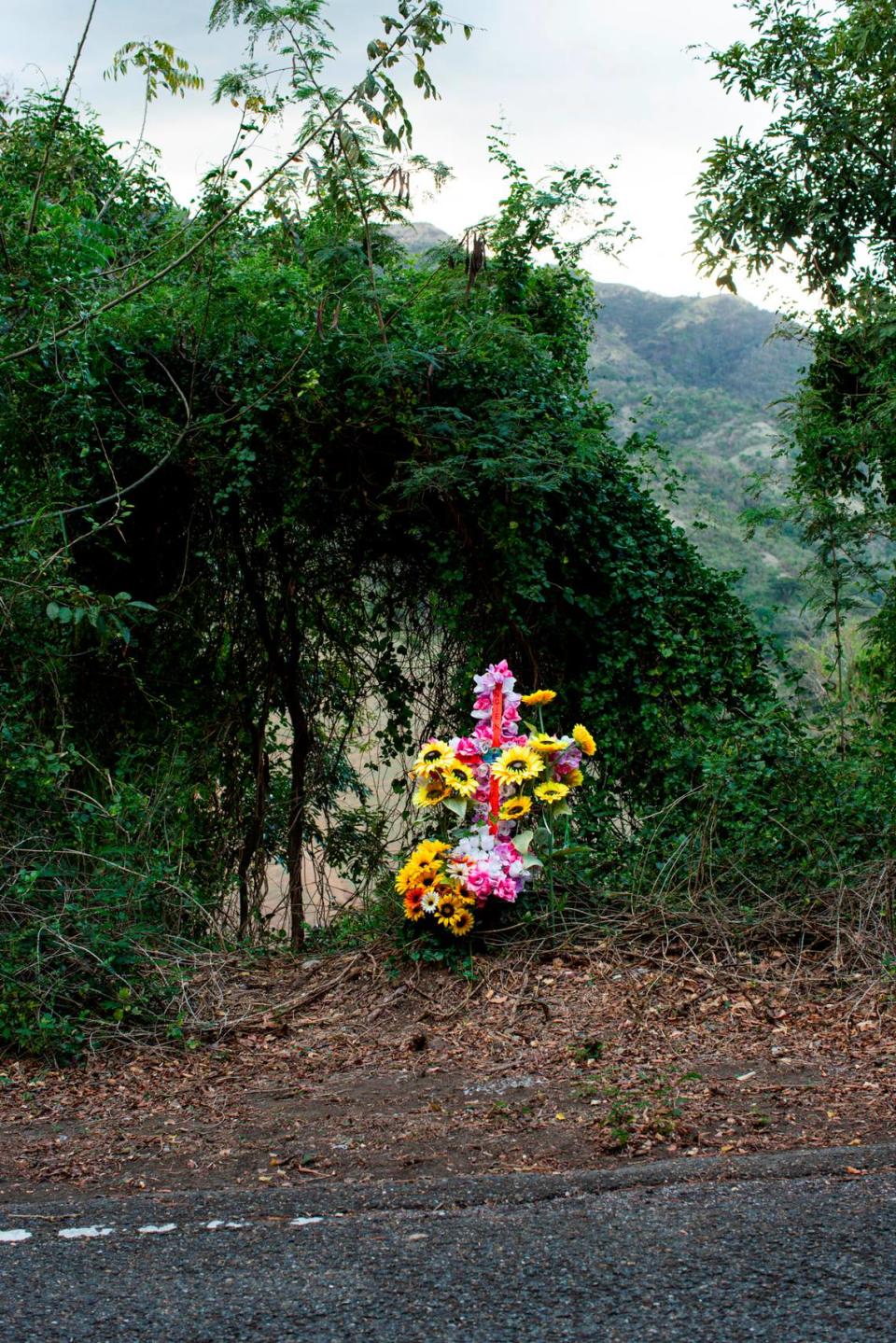 The roadside cross in Coamo, Puerto Rico, on March 21, 2021. The González Santos family erected the memorial to remember Angie González, who was allegedly killed by her partner of 16 years in January 2021.