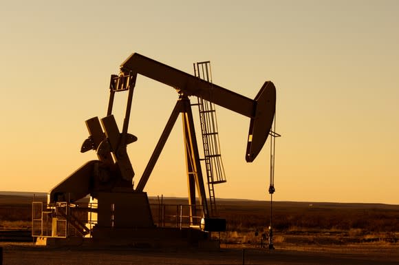 Sunlight fading on an oil pump in Texas.