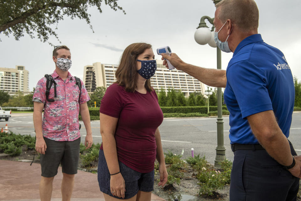 Anyone displaying a temperature of 100.4 degrees Fahrenheit or higher will be directed to an additional location for re-screening and assistance; those who again measure 100.4 degrees Fahrenheit or higher will not be allowed entry, nor will those in their party. (Disney/Kent Phillips, photographer)