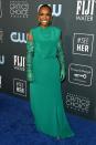 <p>In a green dress and sparkling gloves, Janet Mock is ready for anything.</p>