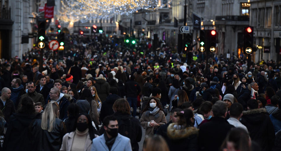 People shop on Regent Street on December 12, 2020 in London, England