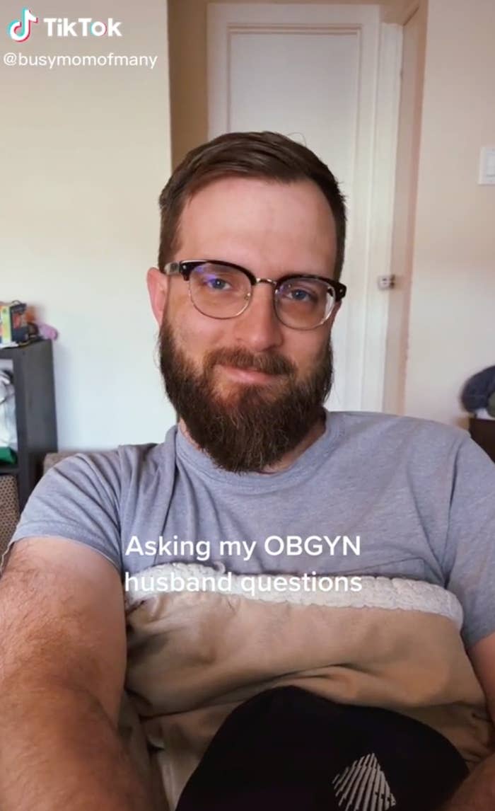 TikTok screenshot of man with the text "Asking my OBGYN husband questions"