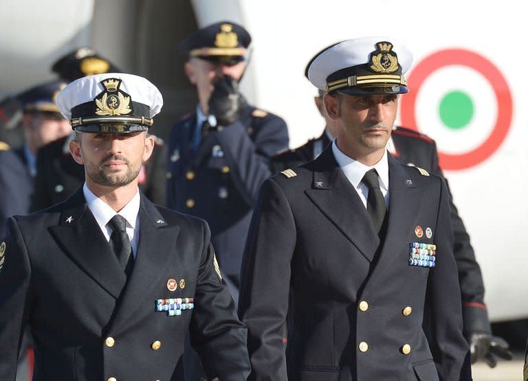 Italian marines Massimiliano Latorre (right) and Salvatore Girone arrive at Ciampino airport near Rome, on December 22, 2012. Sonia Gandhi -- the Italian-born head of India's ruling party -- has accused Rome of an unacceptable "betrayal" as she waded into a bitter dispute over two marines who have skipped bail