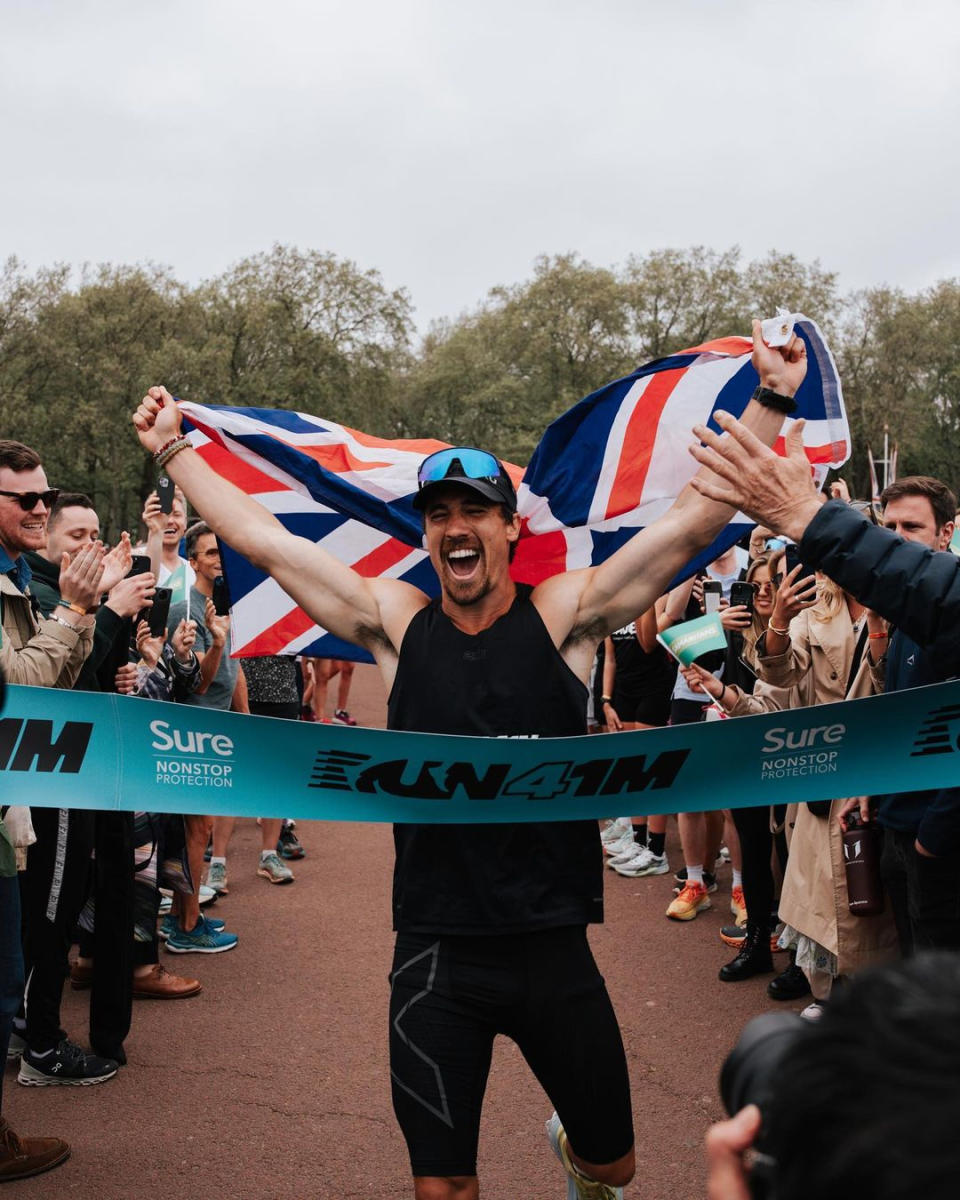 Joshua Patterson, on the day in May 2023 he became the first person in history to run a marathon in all 76 cities of the UK. (Supplied)