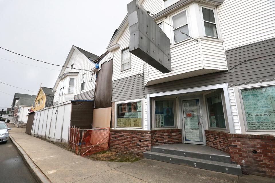 The former Pizza by Paras building at 16 Railroad Ave. in York Beach is next to Johnny's Candy Corner. Town officials believe unpermitted work at the closed pizzeria have caused damage on to the candy store's foundation.