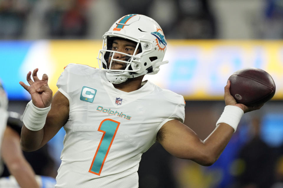 Miami Dolphins quarterback Tua Tagovailoa throws during the first half of an NFL football game against the Los Angeles Chargers Sunday, Dec. 11, 2022, in Inglewood, Calif. (AP Photo/Mark J. Terrill)