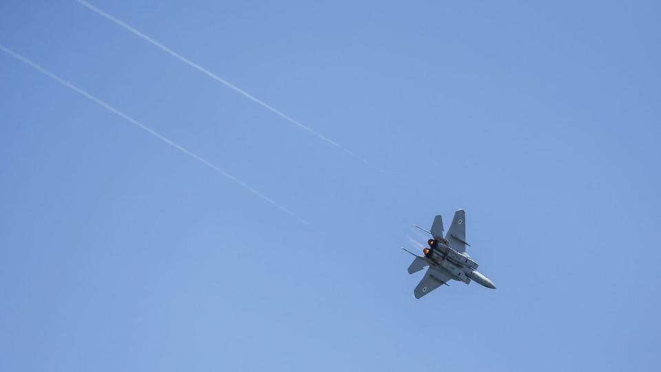 An Israeli F-15 fighter jet flies during a 2018 air show in the Mediterranean coastal city of Tel Aviv. (Ahmad Gharabli/AFP via Getty Images)