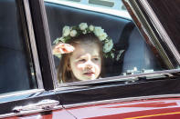 <p>Hearts melted when bridesmaid Princess Charlotte excitedly pressed her face to the window during the car procession to the chapel. Photo: Getty </p>