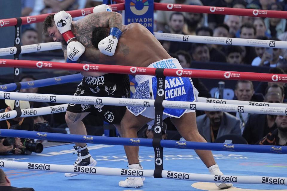 Andy Ruiz Jr., left, fights Jarrell Miller, right, duri