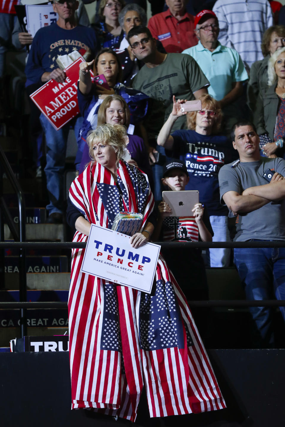 Supporters stand as they wait to hear President Donald Trump speak at a campaign rally at WesBanco Arena, Saturday, Sept. 29, 2018, in Wheeling, WV. (AP Photo/Pablo Martinez Monsivais)