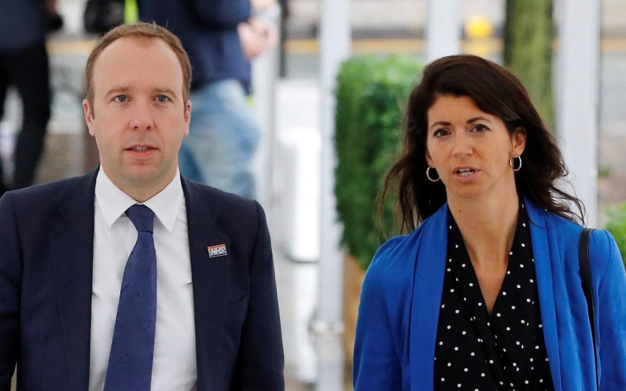 Britain's Secretary of State for Health Matt Hancock walks with his aide Gina Coladangelo outside the venue for the Conservative Party annual conference in Manchester, Britain, September 29, 2019. - Phil Noble/REUTERS