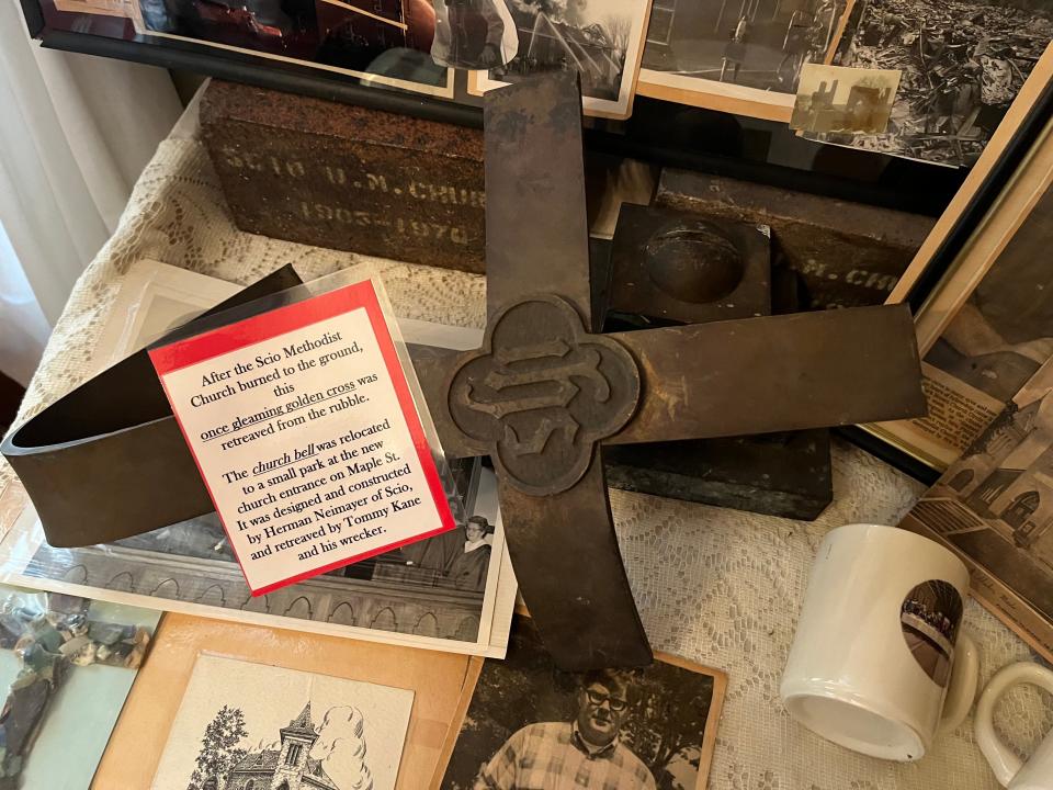 This metal cross, once gold in color, was retrieved from the ruins of the Scio United Methodist Church, which burned in 1970. The cross is now on display at the Scio Historical Museum.