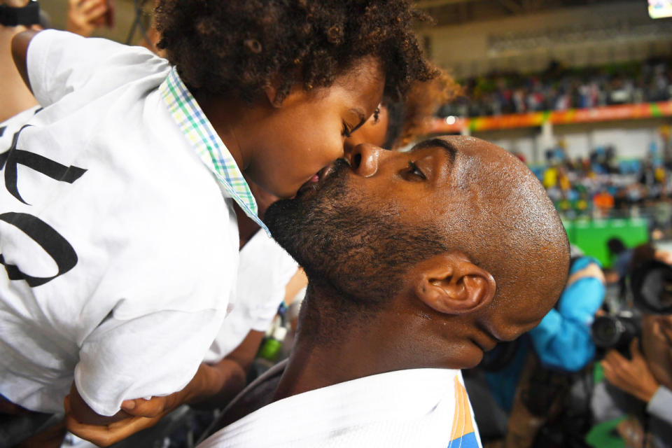 <p>Olympic champion Teddy Riner kisses son Eden after the men’s +100 kg judo final.</p>