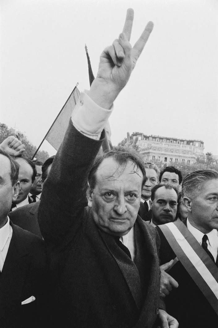 <p>Andre Malraux and other Gaullists rally to President Charles de Gaulle’s call in a radio speech for the “silent majority” to demonstrate against the rioting students and workers. They led more than a half-million supporters to the Arc de Triomphe, where the Gaullist leaders placed a symbolic wreath at the Tomb of the Unknown Soldier in Paris, May 30, 1968. (Photo: Gökşin Sipahioğlu/SIPA) </p>