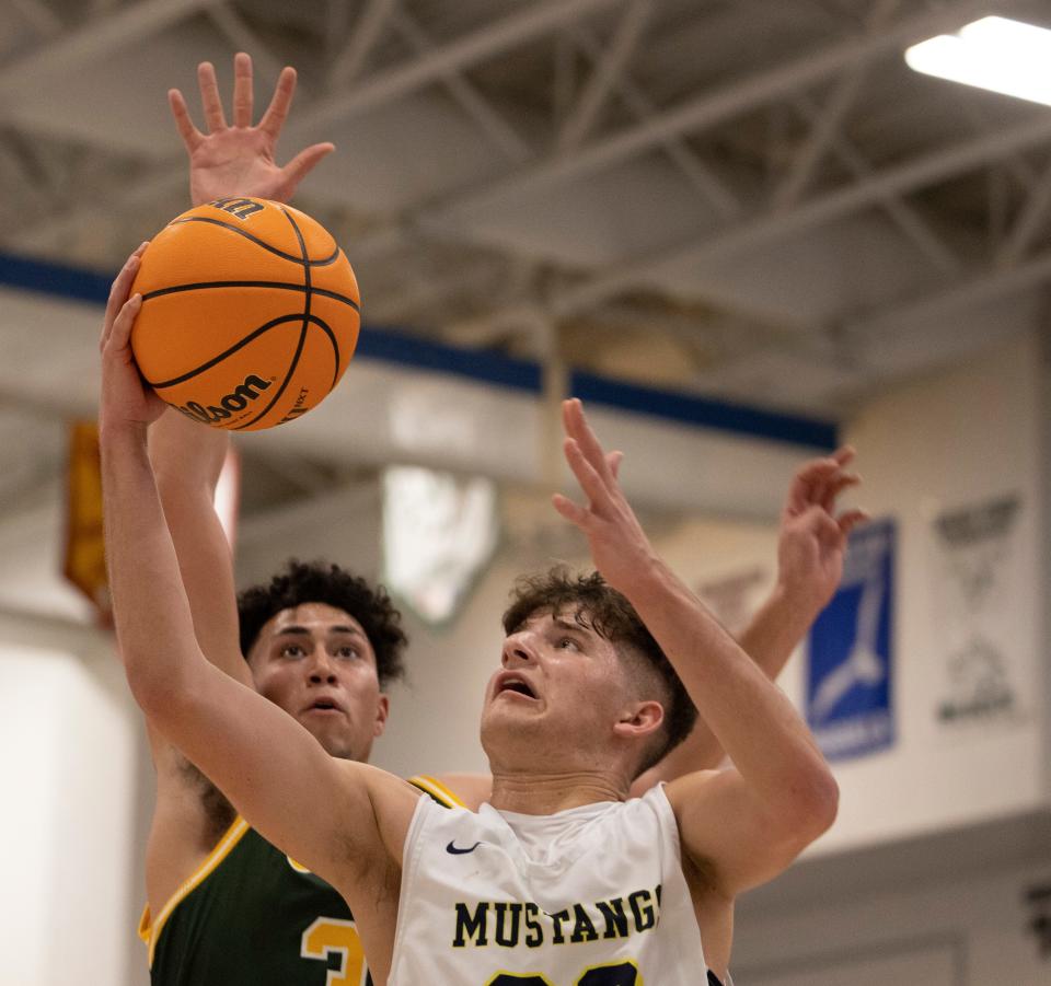 Marlboro Jack Seidler goes up with a shot in second half. Marlboro Boys Basketball vs Red Bank Catholic in WOBM Christmas Classic Final on December 30, 2021 in Toms River, NJ. 