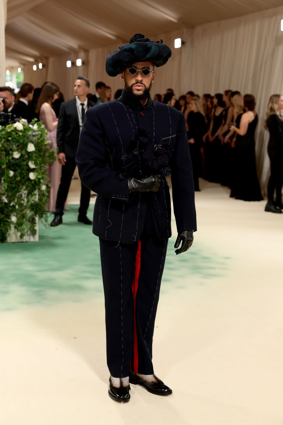 new york, new york may 06 bad bunny attends the 2024 met gala celebrating sleeping beauties reawakening fashion at the metropolitan museum of art on may 06, 2024 in new york city photo by dimitrios kambourisgetty images for the met museumvogue
