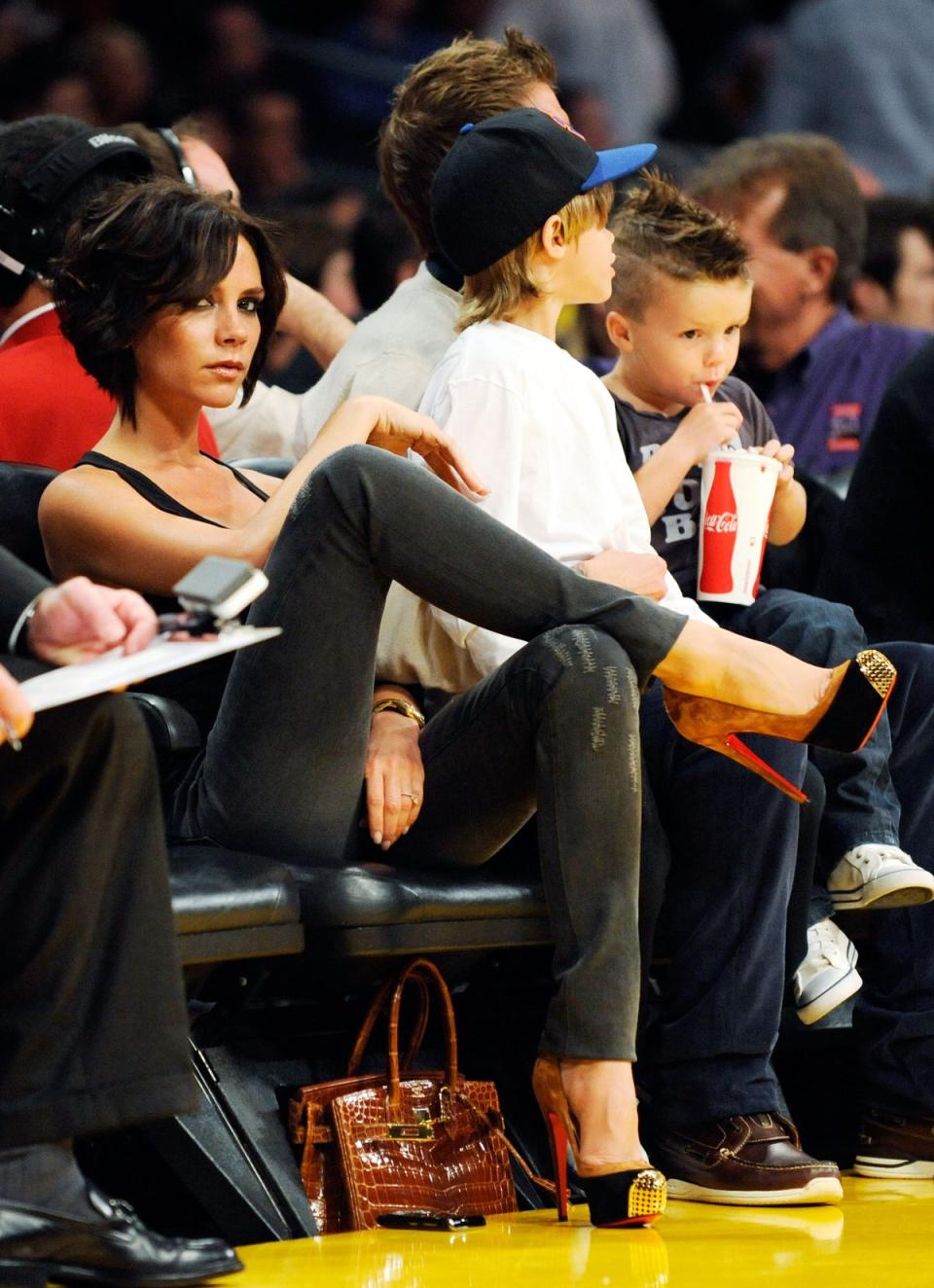 With her family at a basketball game at Staples Center in Los Angeles on October 30, 2009 (Getty Images)