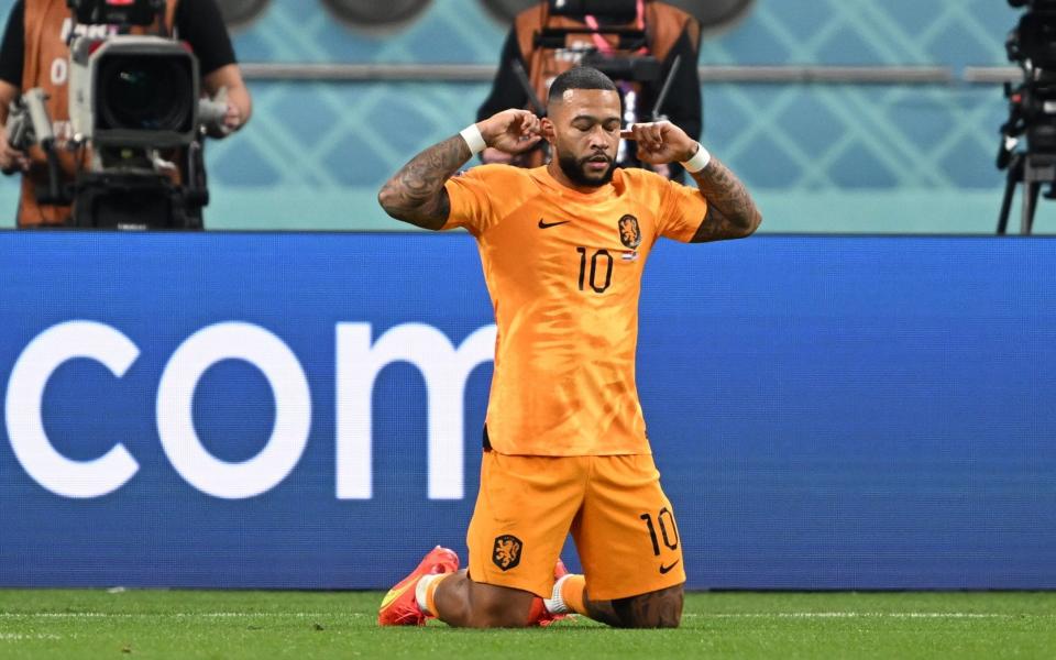 Memphis Depay: 'My goal celebration means to be blind and deaf to the world. I don’t feel anything, I don’t see anything, I only focus' - GETTY IMAGES/ERCIN ERTURK