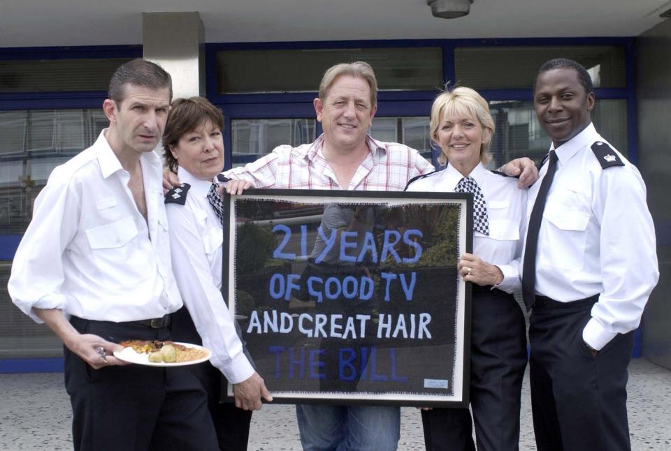 The Bill actors, from left to right; Jeff Stewart, Roberta Taylor, Mark Wingett, Trudie Goodwin and Cyril Nri pose with an artwork given to the ITV show by artist Tracey Emin to celebrate the police drama's 21st anniversary at their studio in south London.