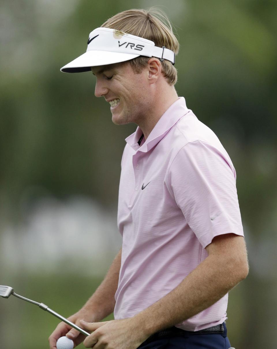 Russell Henley reacts after missing a putt on the ninth hole during the first round of the Honda Classic golf tournament on Thursday, Feb. 27, 2014, in Palm Beach Gardens, Fla. (AP Photo/Wilfredo Lee)