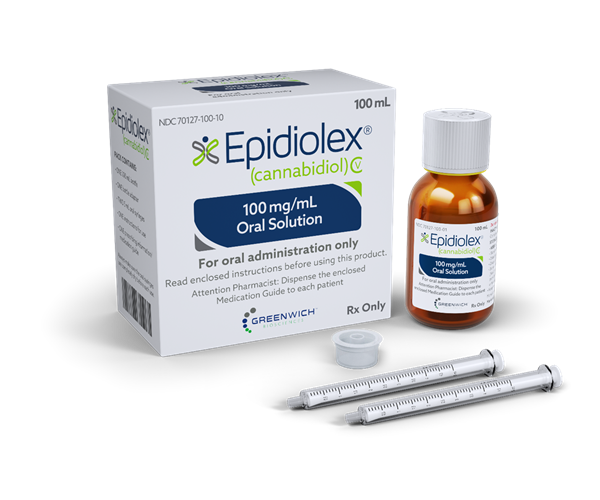 A vial of Epidiolex next to its packaging and two droppers.