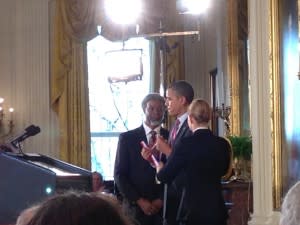 Sylvester Gates receives his medal from President Obama. Credit: Mariette DiChristina