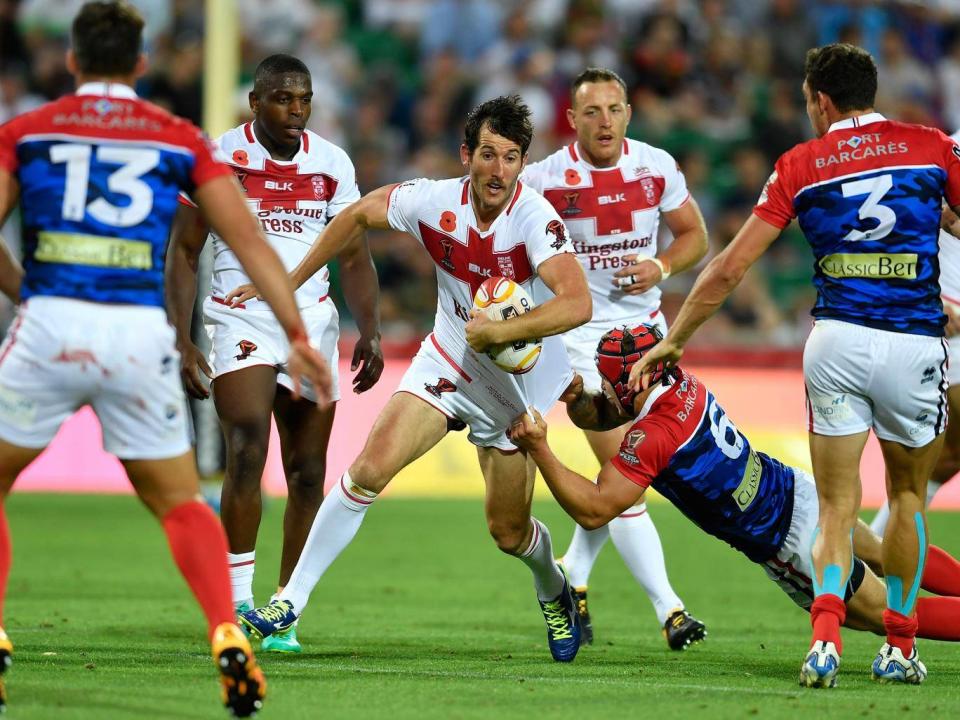 Stefan Ratchford is tackled during England's victory over France (NRLPhotos)