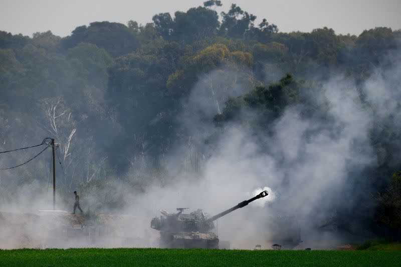 An artillery unit fires towards Gaza