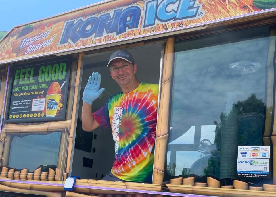 Matthew Almaroad with Kona Ice was on hand to cool things down, plus donate 25 percent of his profits to the school at the Karns Community Fair at Karns High School Saturday, July 16, 2022.