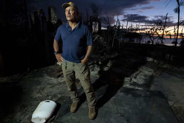 <p>Mengshin Lin for The Washington Post via Getty</p> Archie Kalepa, community leader of Hawaii Homes Leialii - a Native Hawaiian community in Lahaina, is pictured during an interview in front of a burned house where the wildfire stopped before spreading into the 128 Hawaiian homes in Lahaina on August 12, 2023.