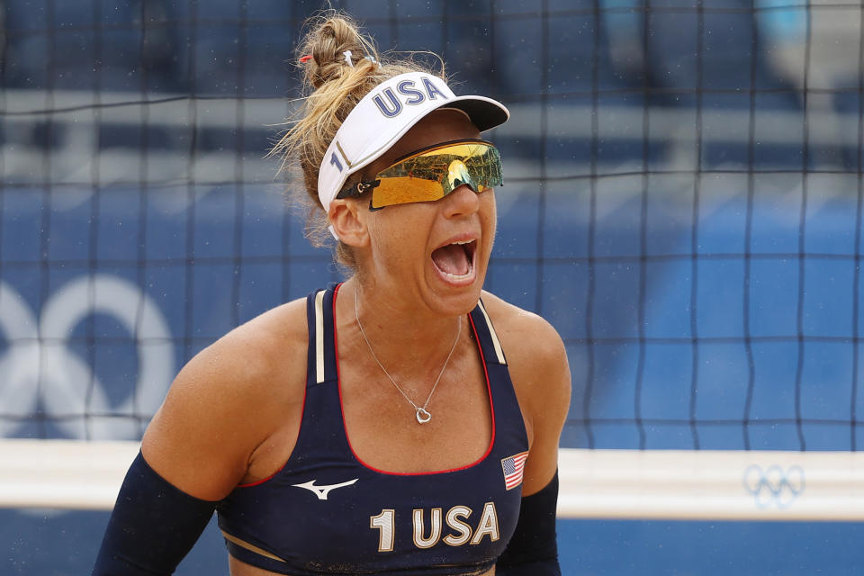 TOKYO, JAPAN - JULY 27: April Ross #1 of Team United States celebrates against Team Spain during the Women's Preliminary - Pool B beach volleyball on day four of the Tokyo 2020 Olympic Games at Shiokaze Park on July 27, 2021 in Tokyo, Japan. (Photo by Sean M. Haffey/Getty Images)