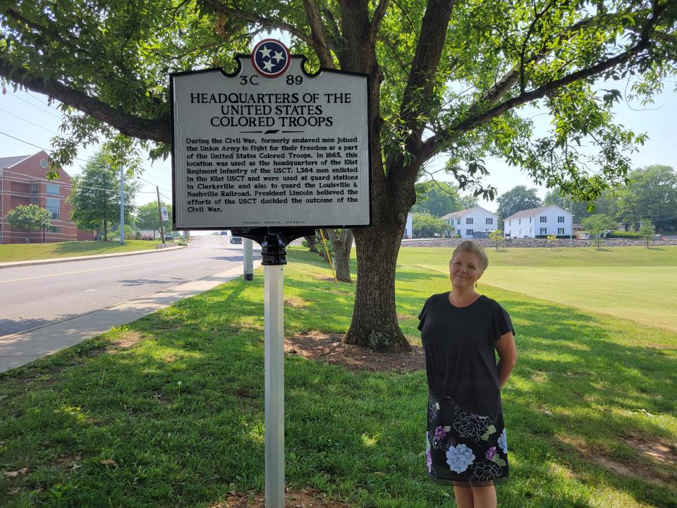 Historian Tracy Jepson beside the newly erected marker for the headquarters of the United States Colored Troops.