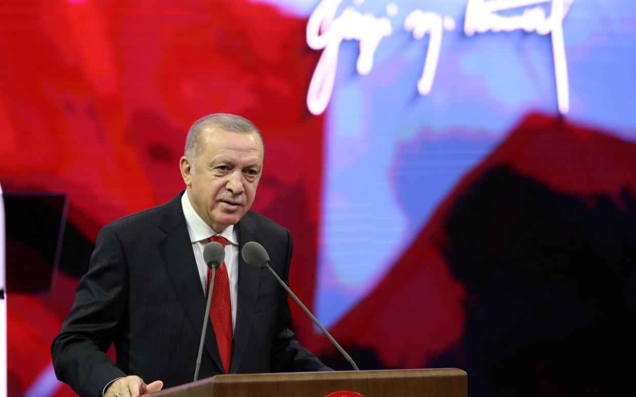 Turkish President Recep Tayyip Erdogan speaks during a ceremony to mark the modern Turkey's founder Ataturk's death anniversary, in Ankara - Reuters