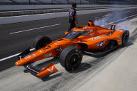 Conor Daly pulls of of the pit area during practice for the Indianapolis 500 auto race at Indianapolis Motor Speedway in Indianapolis, Friday, Aug. 14, 2020. (AP Photo/Michael Conroy)