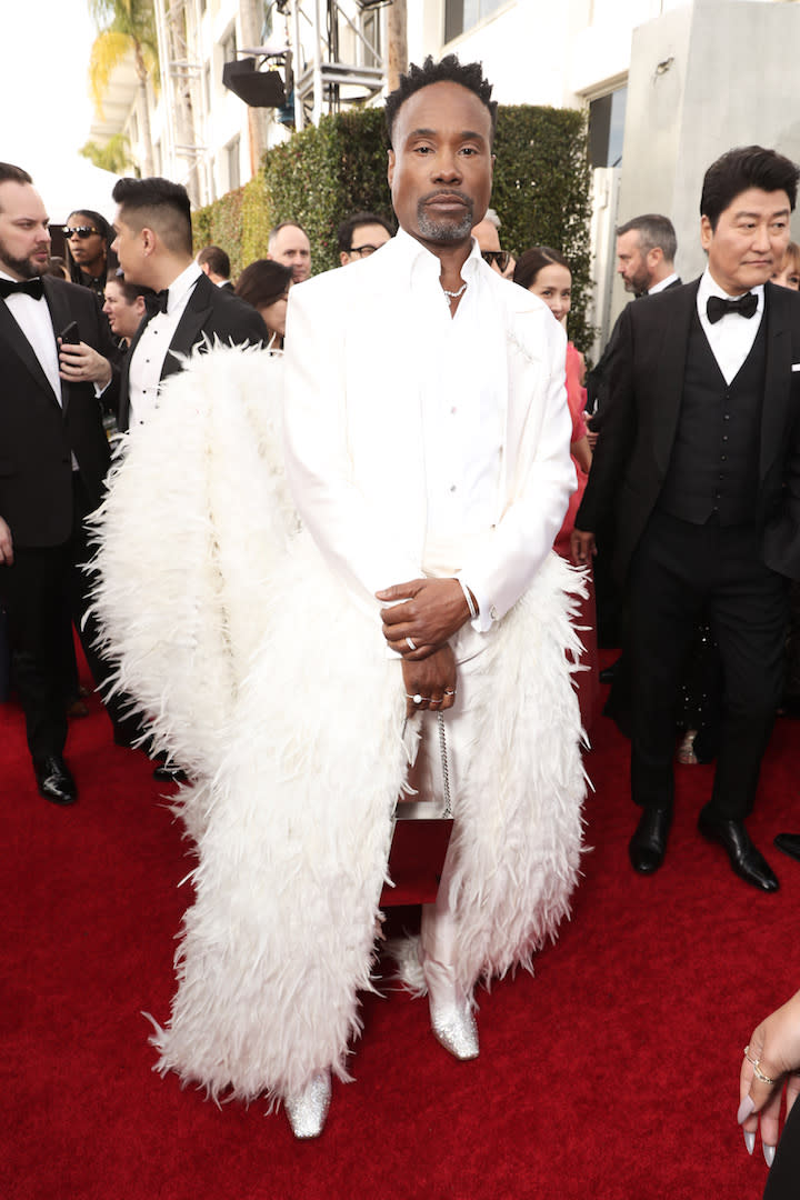 Wearing a custom feathered ensemble by Alex Vinash with Jimmy Choo shoes and Tiffany & Co. jewels. <em>[Photo: Getty]</em>