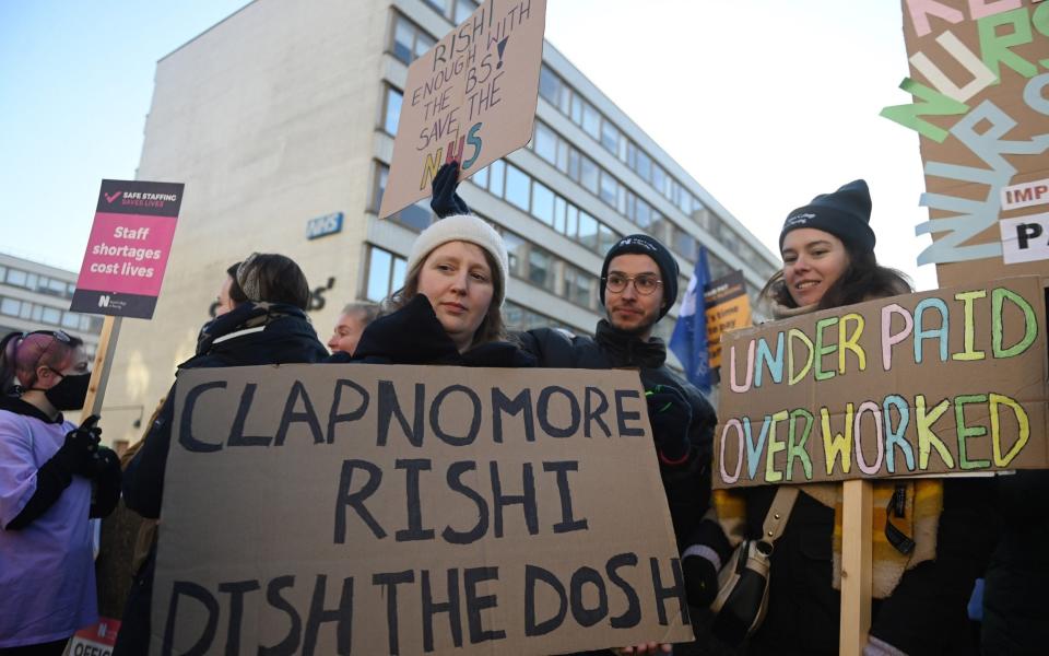 NHS workers have been on strike this week in a dispute over pay, as OECD figures show real incomes declined in Britain in the third quarter of last year - NEIL HALL/EPA-EFE/Shutterstock