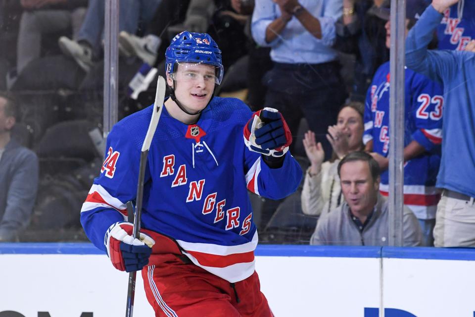 Oct 5, 2023; New York, New York, USA; New York Rangers right wing Kaapo Kakko (24) celebrates his goal against the Boston Bruins during the first period at Madison Square Garden.