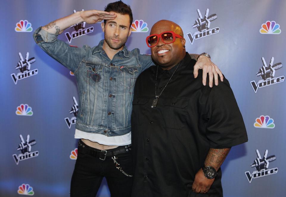 FILE - In this March 15, 2011 file photo, singers Adam Levine, left, and Cee Lo Green, pose at the set of "The Voice, " television series at Los Angeles Center Studios, in Los Angeles. It's likely no consolation that over on NBC's "The Voice," which has regularly toppled "Idol" in the ratings this year, drama-free celebrity panelists like Usher, Adam Levine, Cee Lo Green and Shakira actually seem to all get along. (AP Photo/Damian Dovarganes, File)