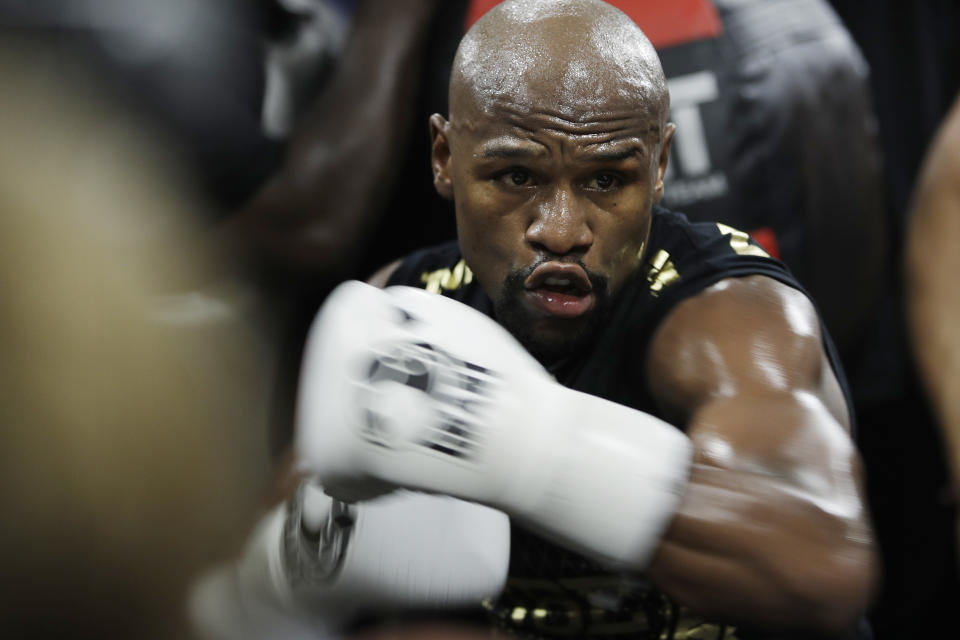 Floyd Mayweather Jr. trains at his gym in preparation for his fight with Conor McGregor. (AP)