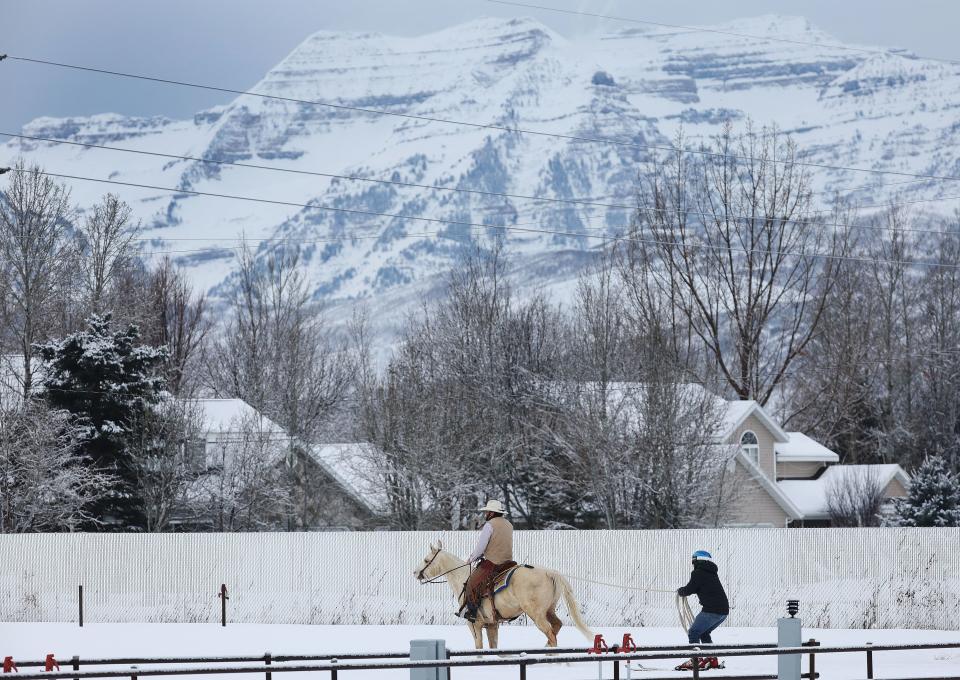 Trevor Howard, on horseback, and skier Scott Hoover practice for an upcoming skijoring competition in Heber City on Tuesday, Feb. 6, 2024. | Jeffrey D. Allred, Deseret News