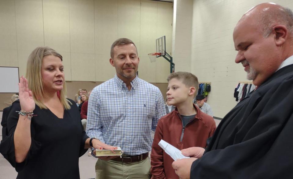 Returning Davidson County Board of Education member Ashely Carroll is sworn in for her second term during a school board meeting on Monday.