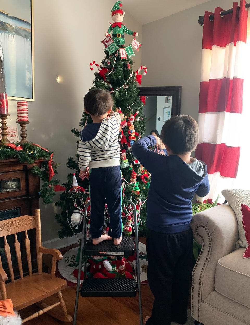 A.J. and Michael Schuber, ages 7 and 3, took the tree decorating into their own hands during a challenging year for their family. (Courtesy Sheena Schuber)