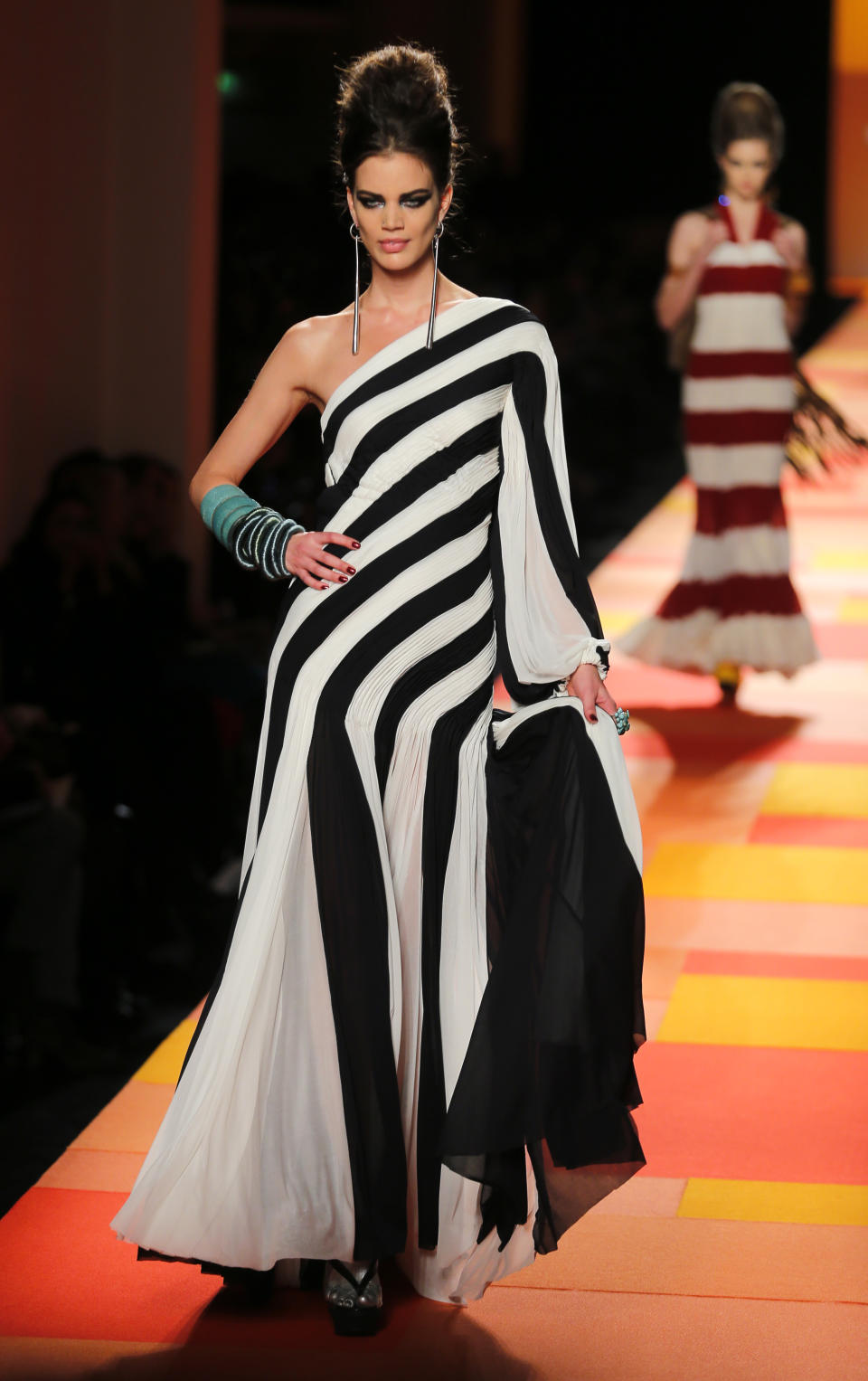 A model presents a creation for French fashion fashion designer Jean-Paul Gaultier's Spring-Summer 2013 Haute Couture fashion collection, presented in Paris, Wednesday, Jan.23, 2013. (AP Photo/Jacques Brinon)