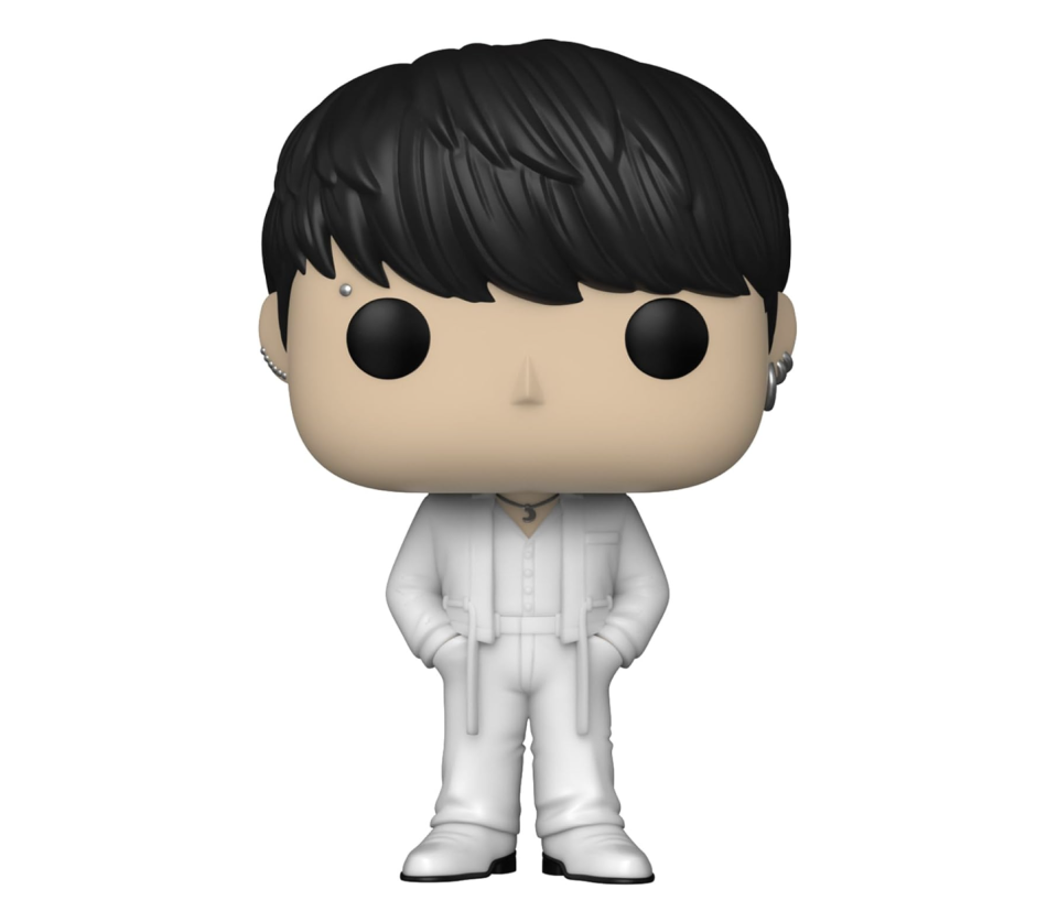 figurine with silver piercings and black hair and all white suit