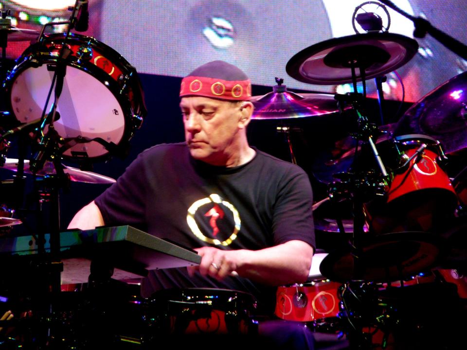 Neil Peart plays the drums.