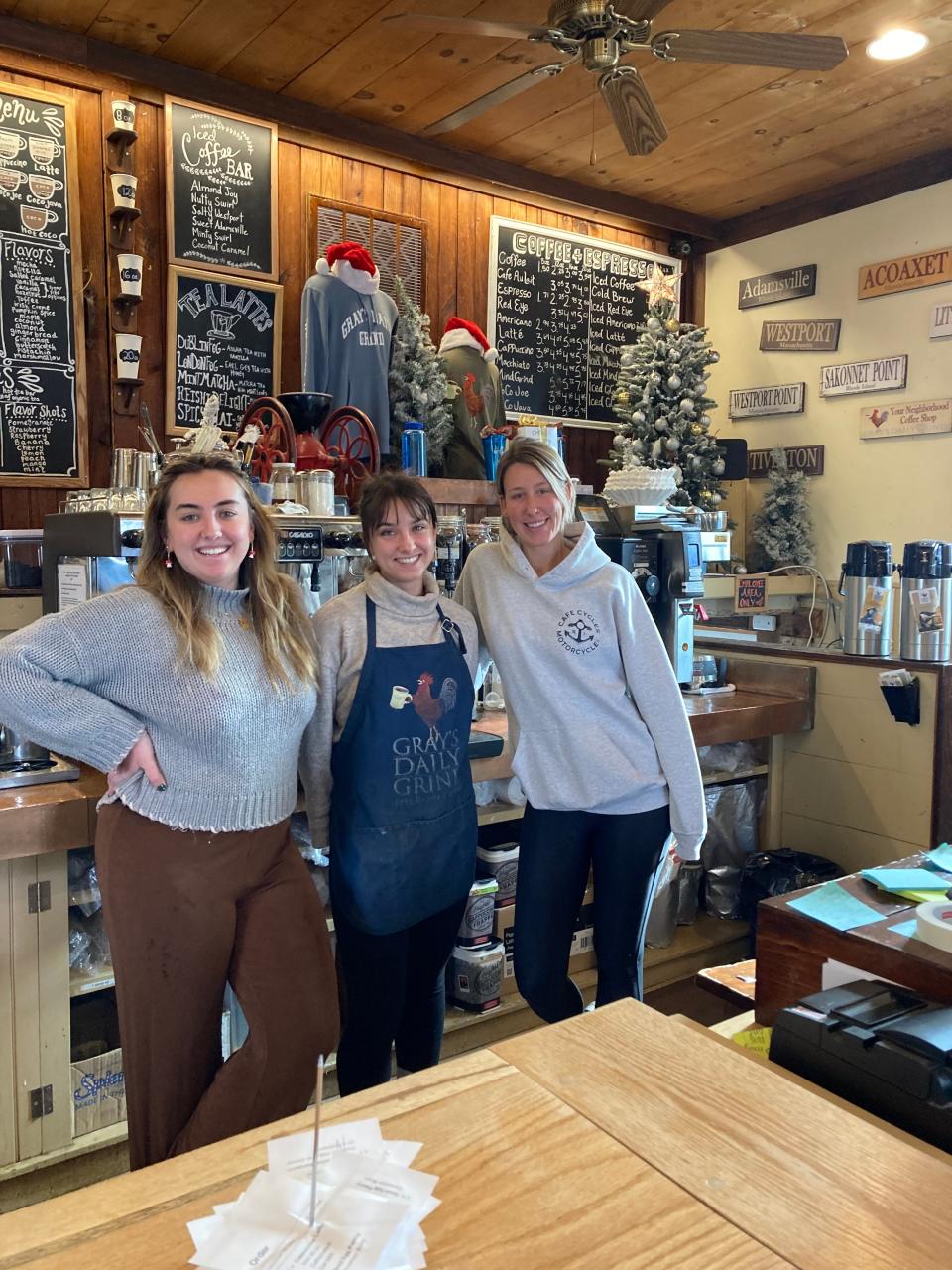 New owner Sarah Delano (r) with baristas Alex Ash and Sarah Henry at Gray's Daily Grind in Westport.