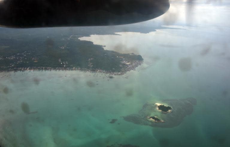 This view from a C-130 Hercules aircraft over the Java Sea shows the coastline of islands during search and rescue operations by the Indonesian Air Force for missing Flight QZ8501 on December 29, 2014