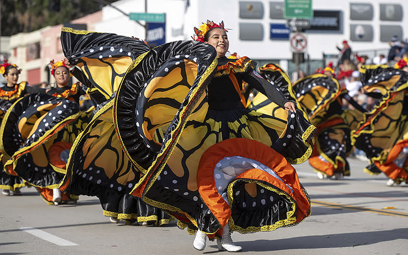 Buhos Marching Band dancers, from Mexico, perform at the 134th Rose Parade in Pasadena, Calif., on Jan. 2.<em> Associated Press/Michael Owen Baker</em>